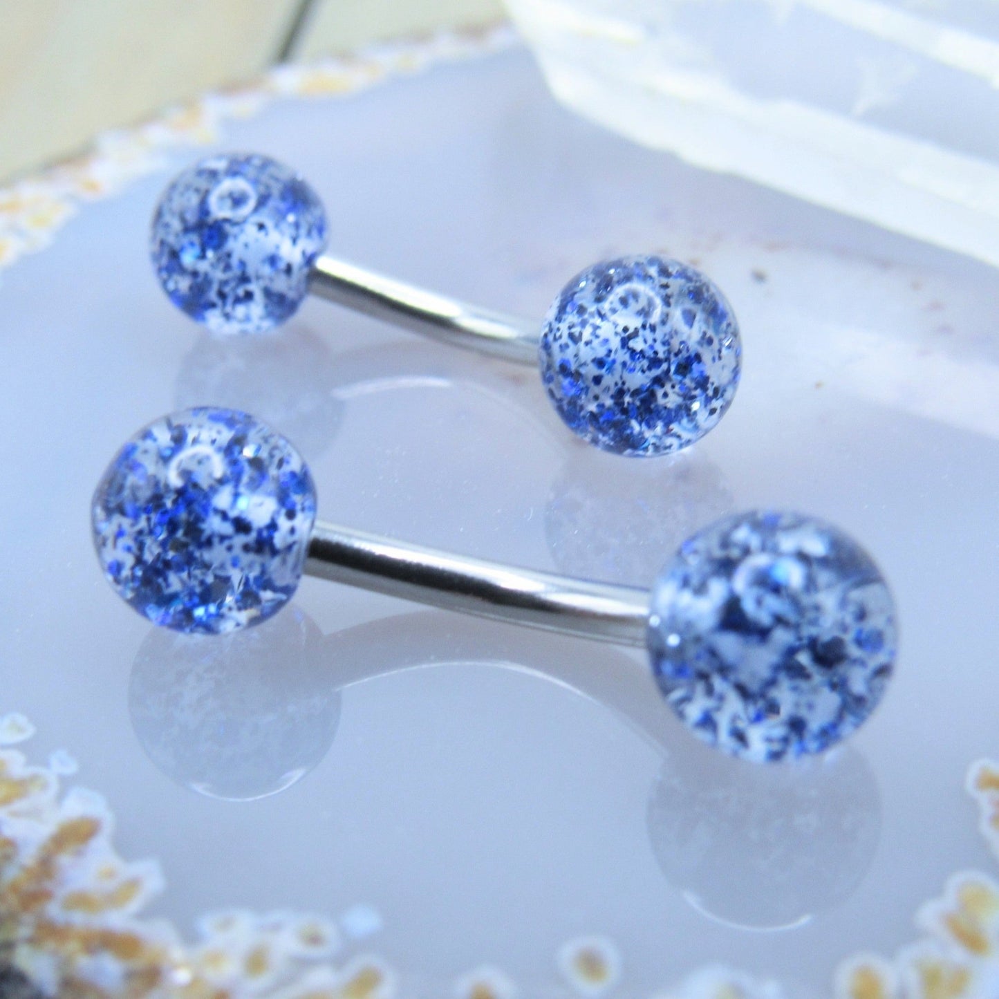 Blue glitter ball curved nipple piercing barbell set 14g 7/16" silver stainless steel pair - Siren Body Jewelry