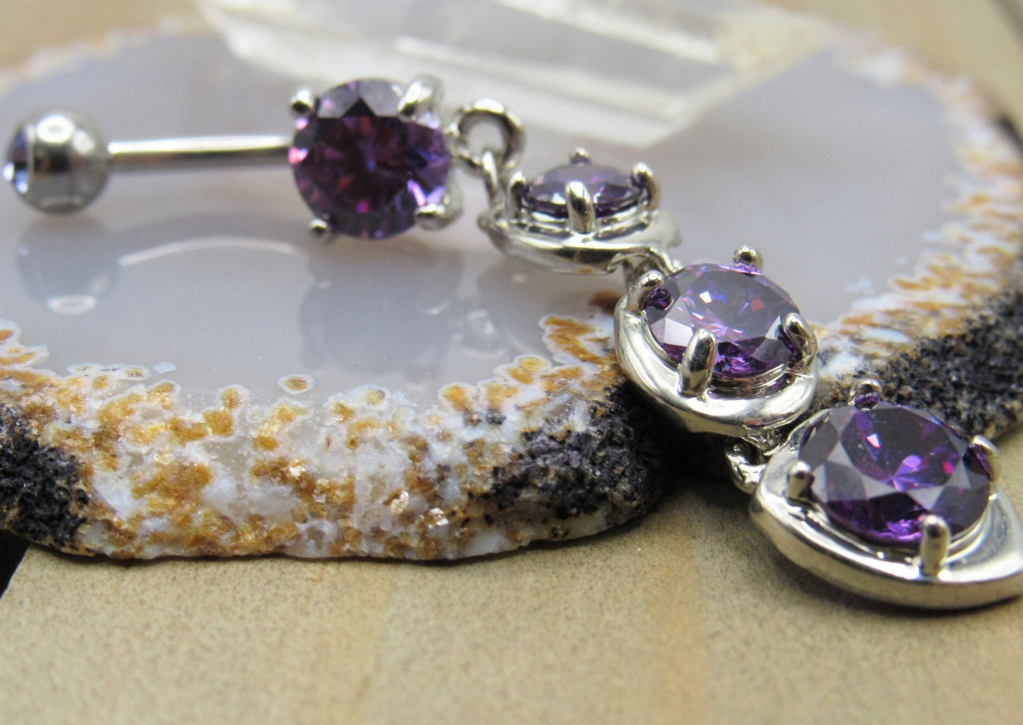 Purple dangle belly button piercing ring 14g 3/8" cascading prong set gemstones silver 316L stainless steel - Siren Body Jewelry
