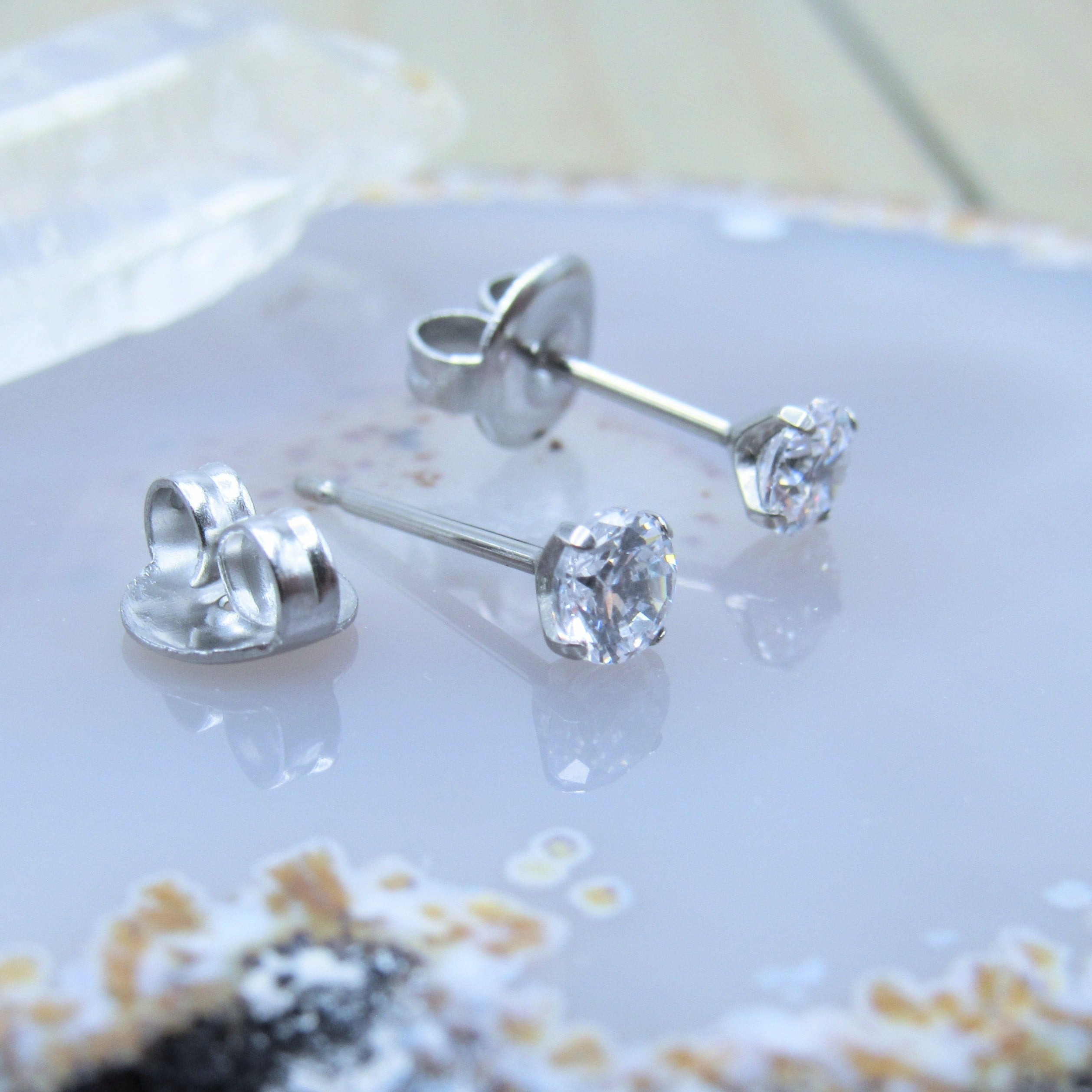 Titanium diamond stud earrings sale