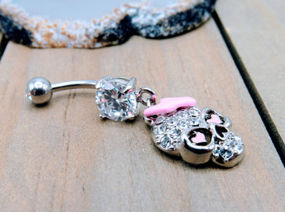 14g Skull belly button piercing ring 7/16" crystal clear gemstones pink bow heart dangle design - Siren Body Jewelry