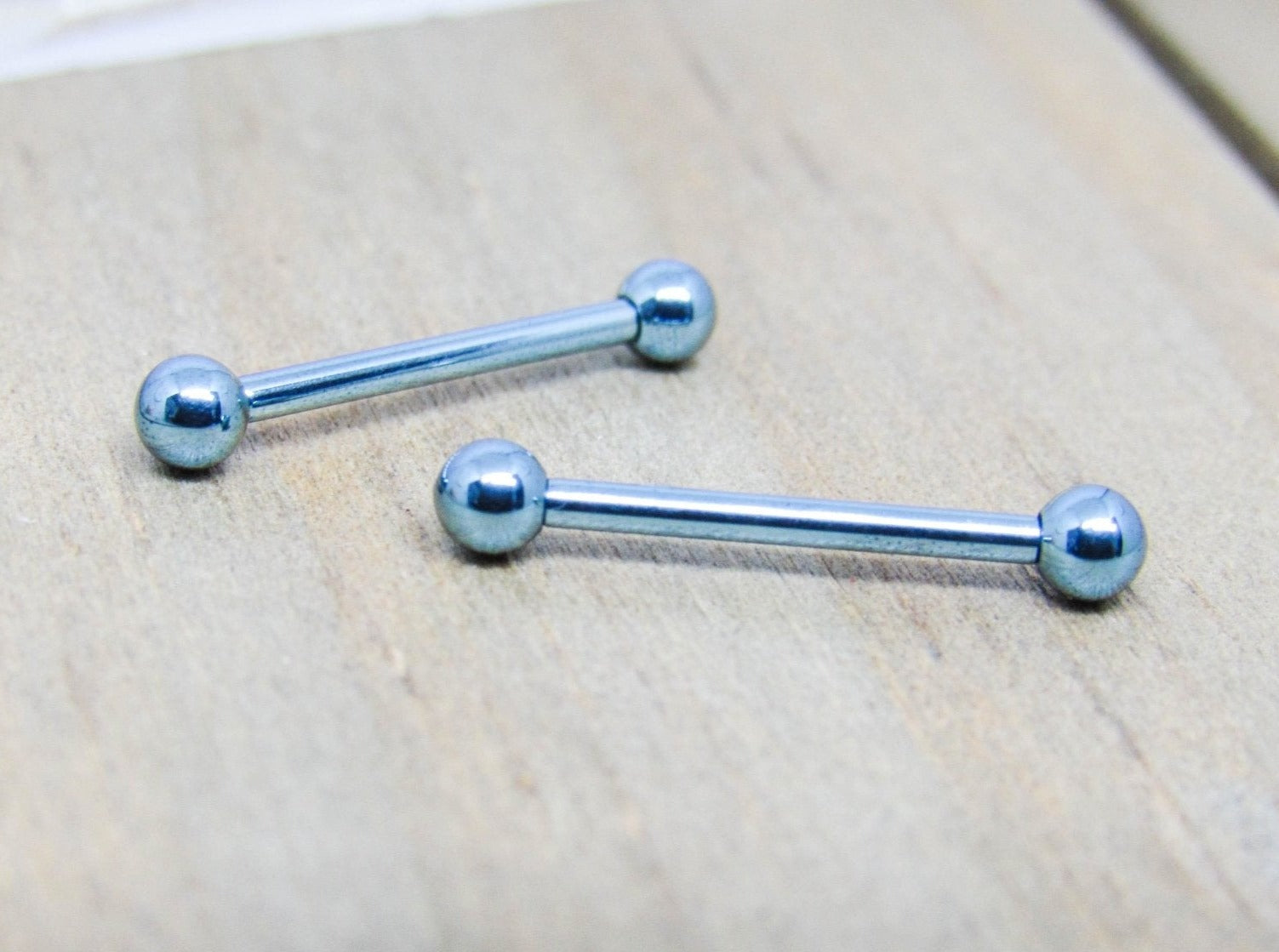 16g titanium nipple piercing barbell set 5/8" ice blue anodized