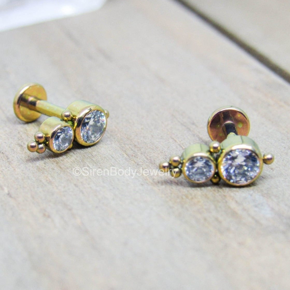 Cluster hot sale ear piercing