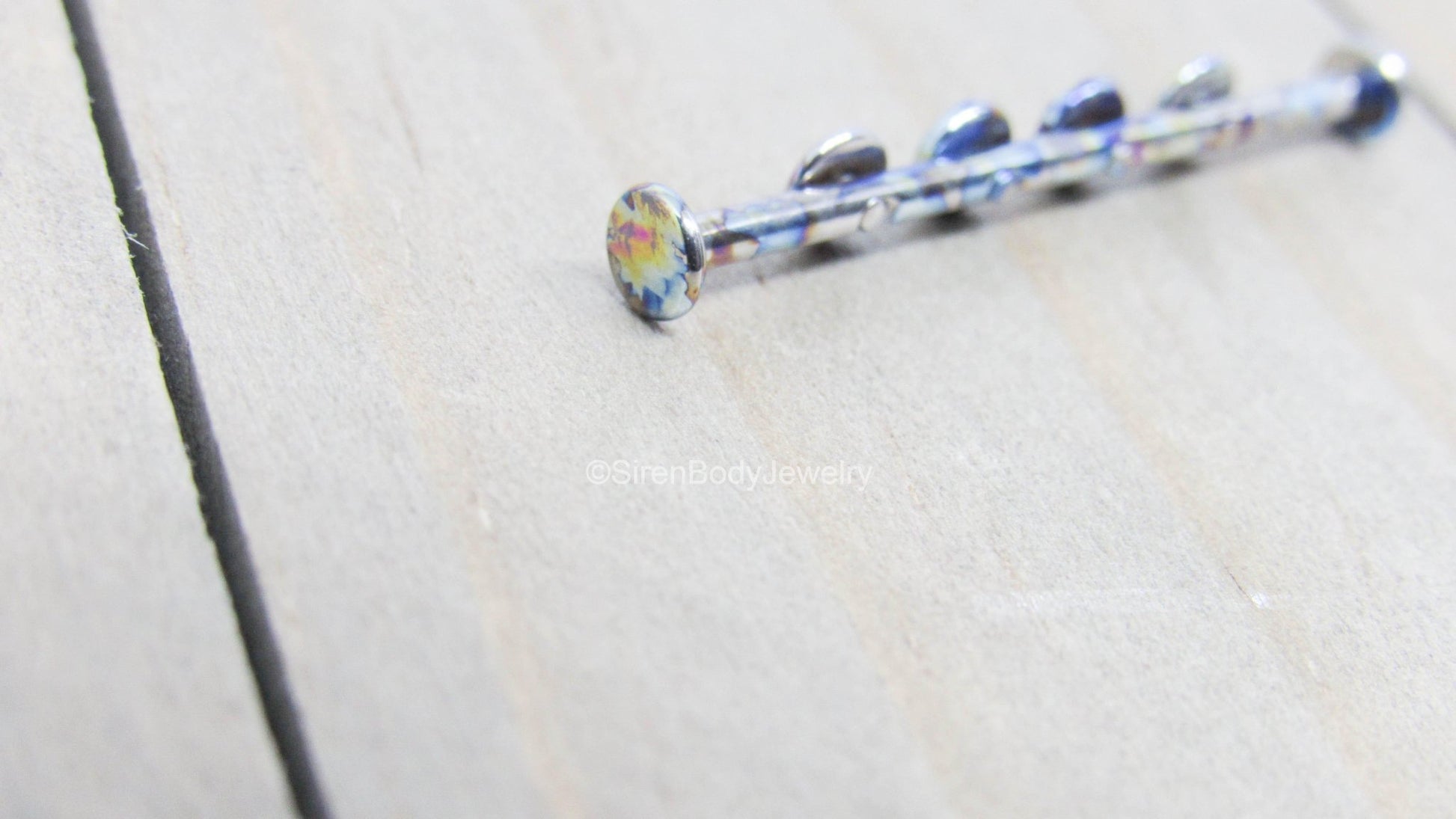 Custom industrial piercing jewelry barbell 14g titanium 4 hole oilslick anodized straight bar 1 1/4" - SirenBodyJewelry