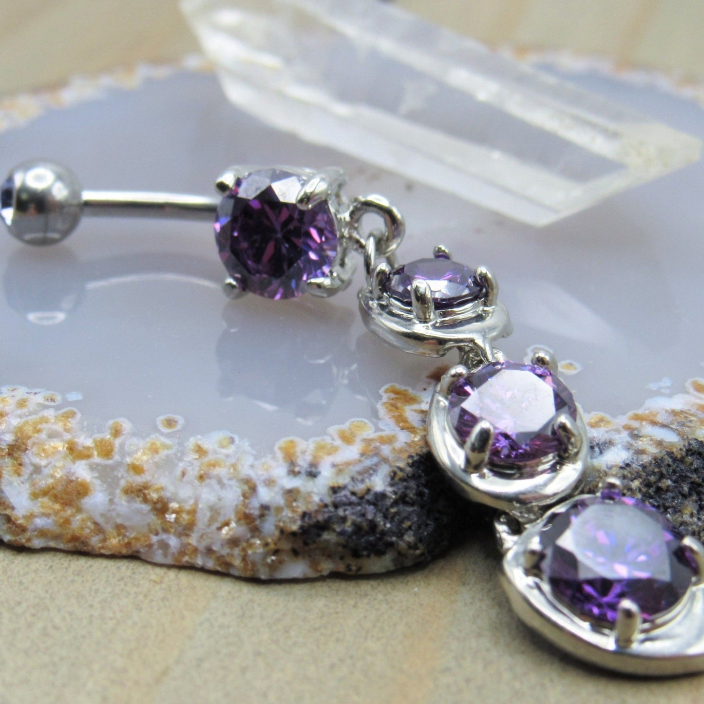 Purple dangle belly button piercing ring 14g 3/8" cascading prong set gemstones silver 316L stainless steel - Siren Body Jewelry