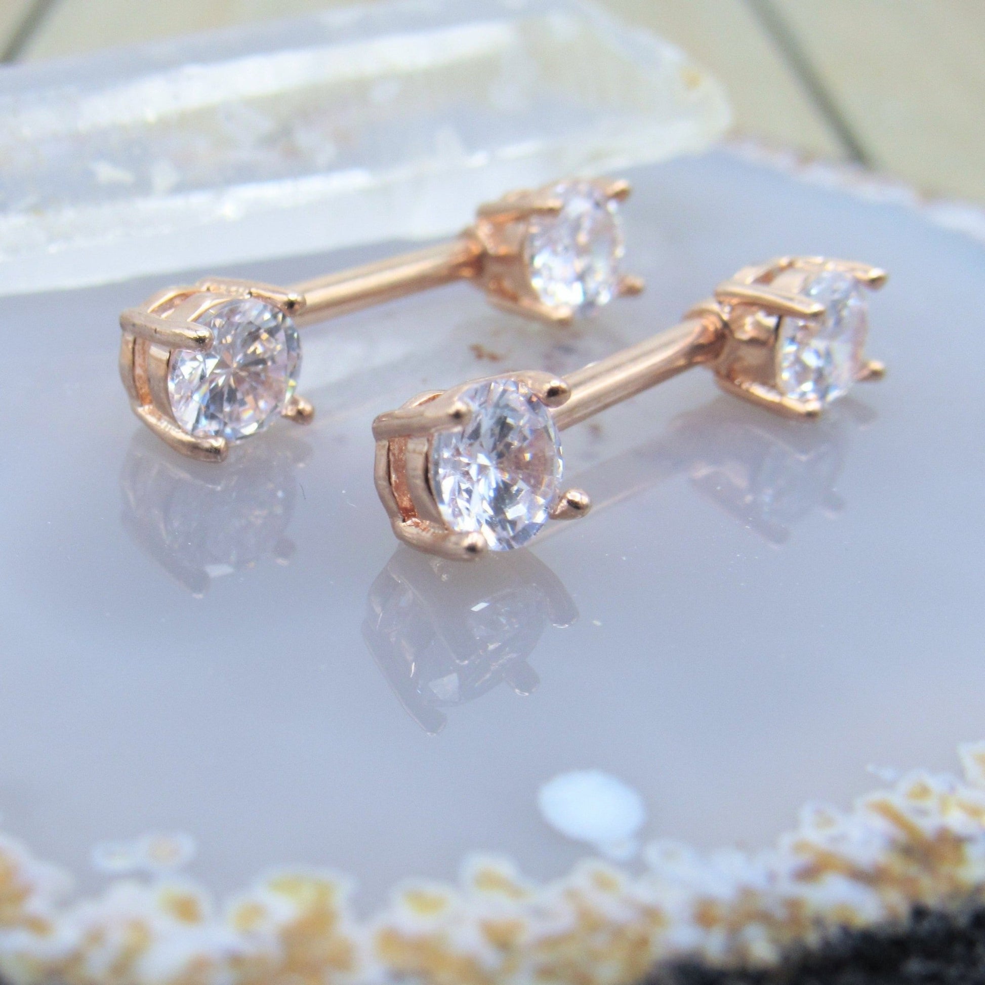 Rose gold nipple piercing barbell set 14g 1/2" crystal clear forward facing prong set gemstones - Siren Body Jewelry