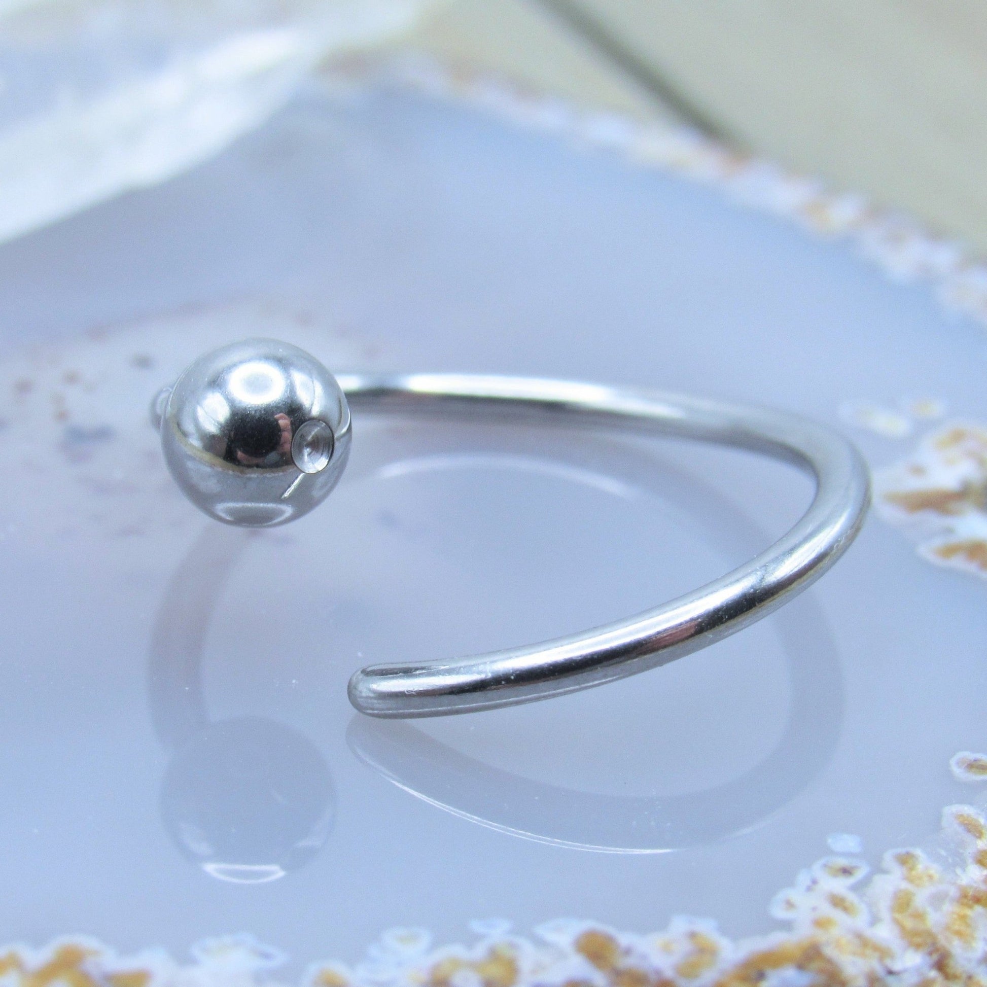 Silver nipple piercing hoop 14g 5/8 diameter annealed fixed bead