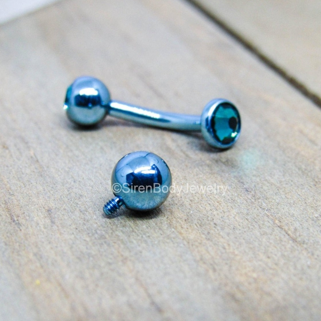 14g titanium anodized ice blue vch floating navel piercing curved barbell ring