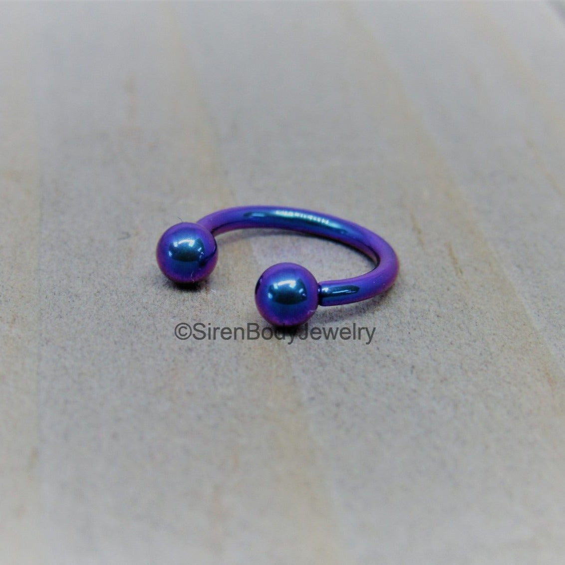 Titanium 16g circular barbell blurple septum horseshoe internally