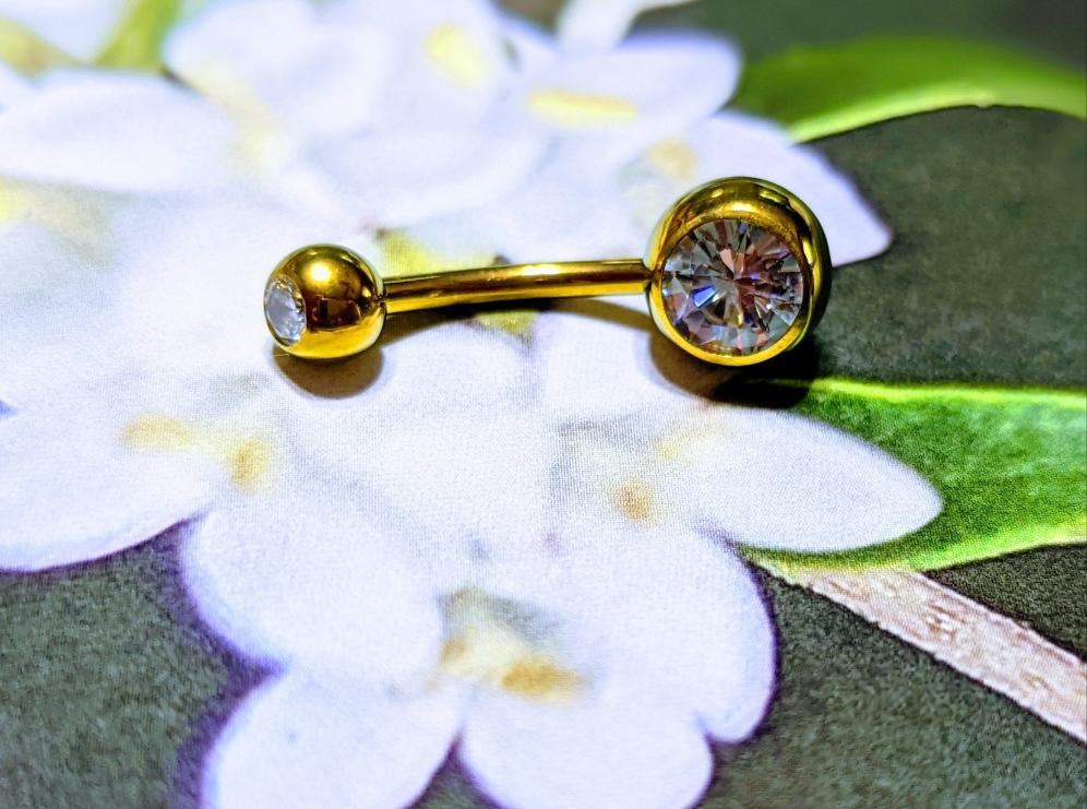 Gold titanium store belly bar