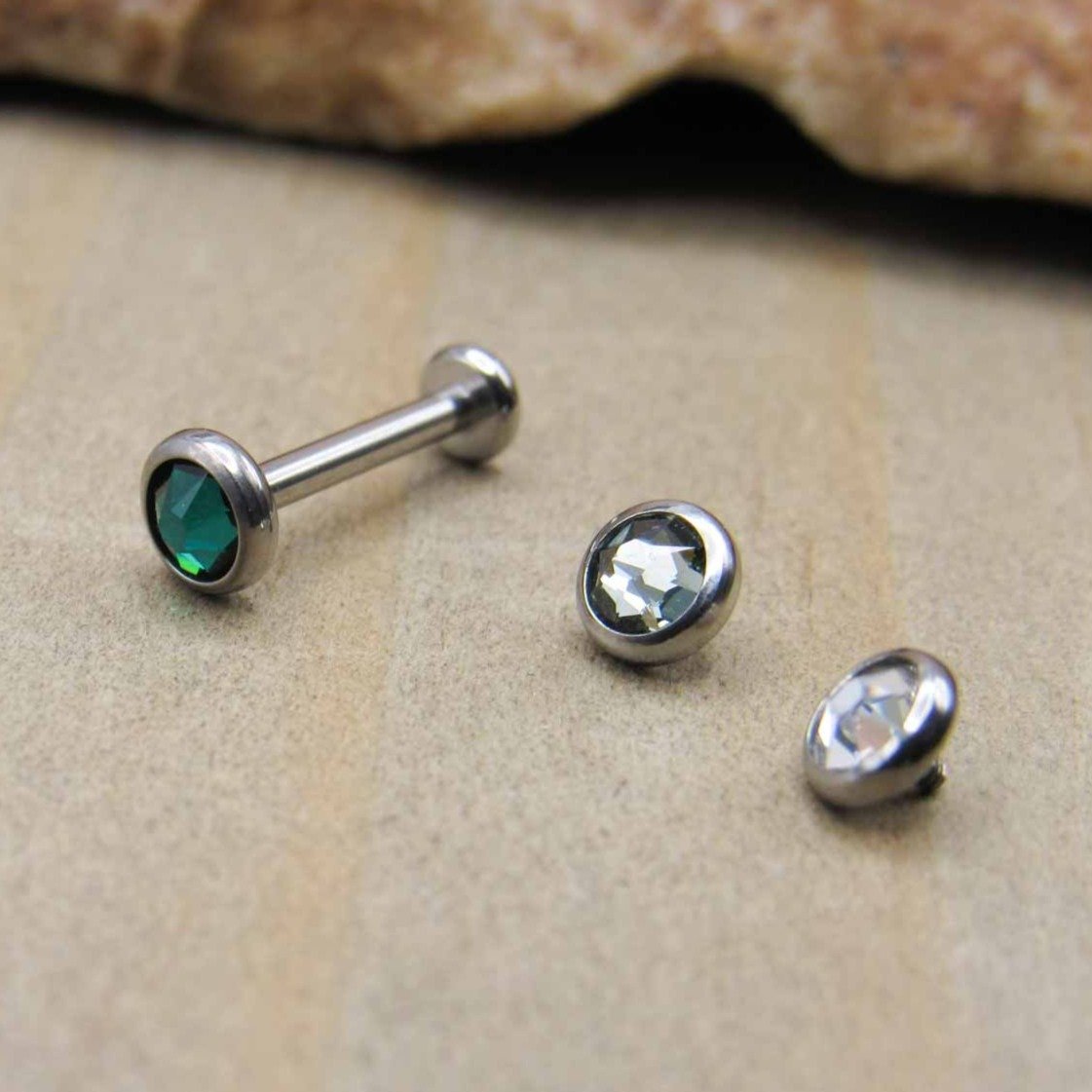 https://sirenbodyjewelry.com/cdn/shop/products/titanium-flat-back-earring-set-of-3-gemstone-ends-1-internally-threaded-labret-stud-helix-earrings-tragus-gems-philtrum-jewelry-conch-earlobe-416534.jpg?v=1630901817&width=1445