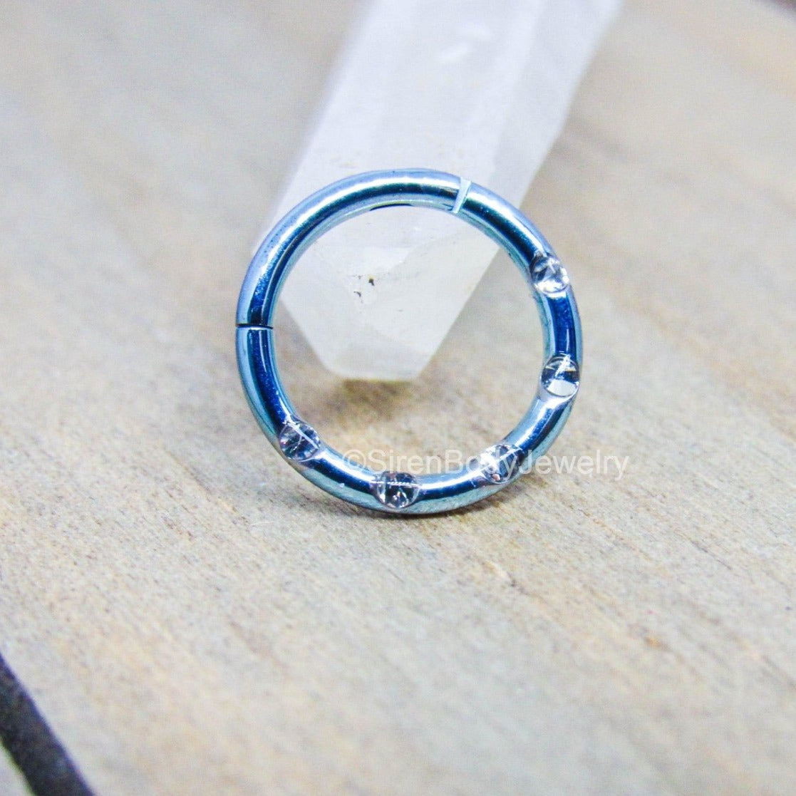 16g titanium hinged segment ring 5 gemstones hypoallergenic anodized ice blue piercing hoop